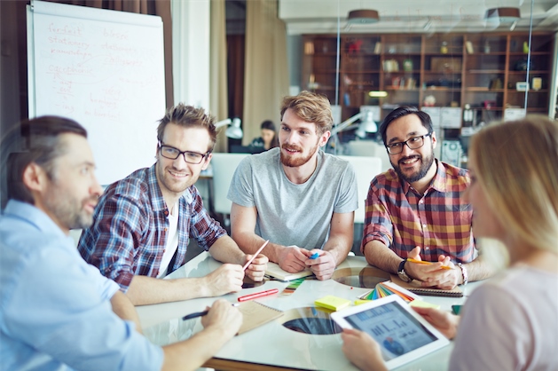 a group of people sitting at a table