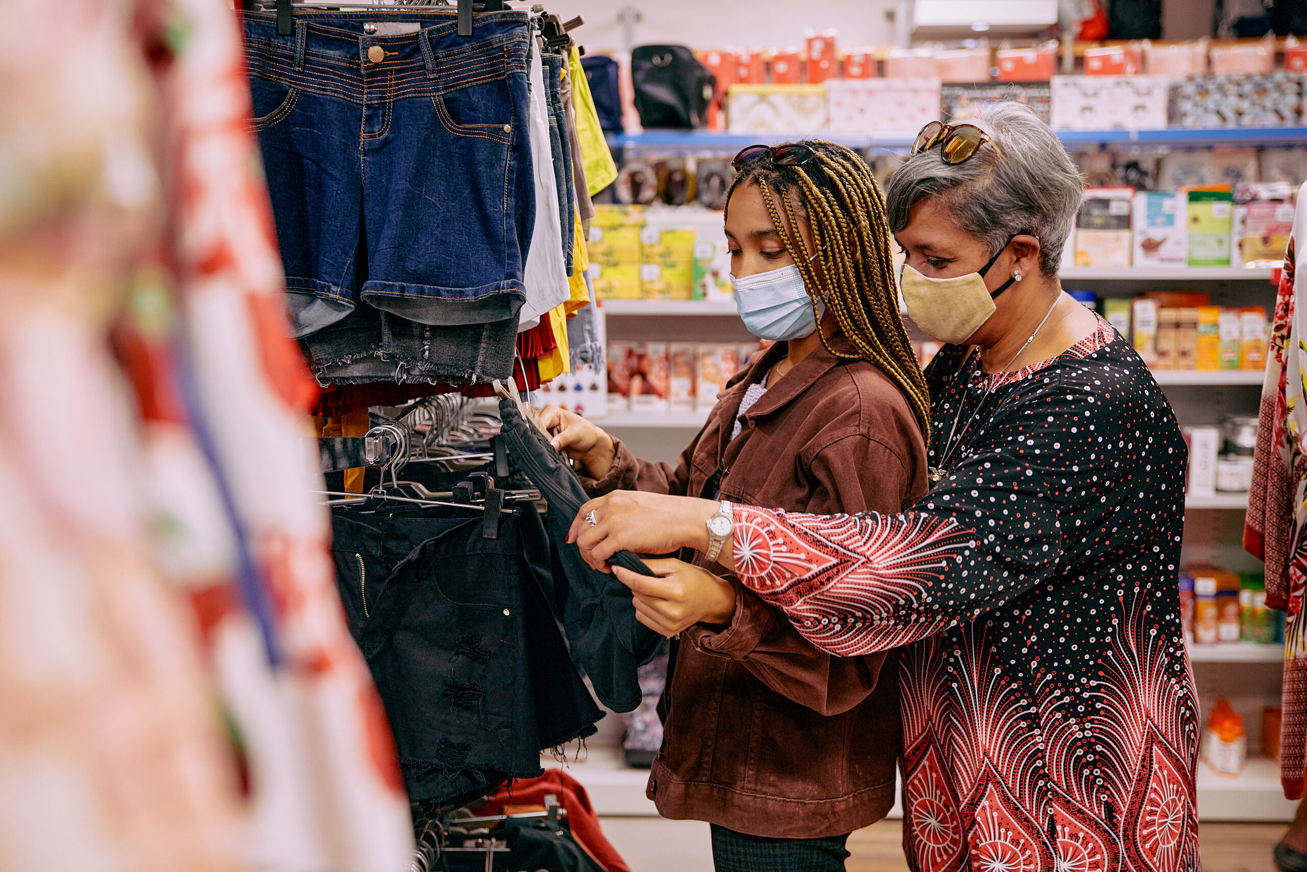 Mother and daughter shopping for clothing