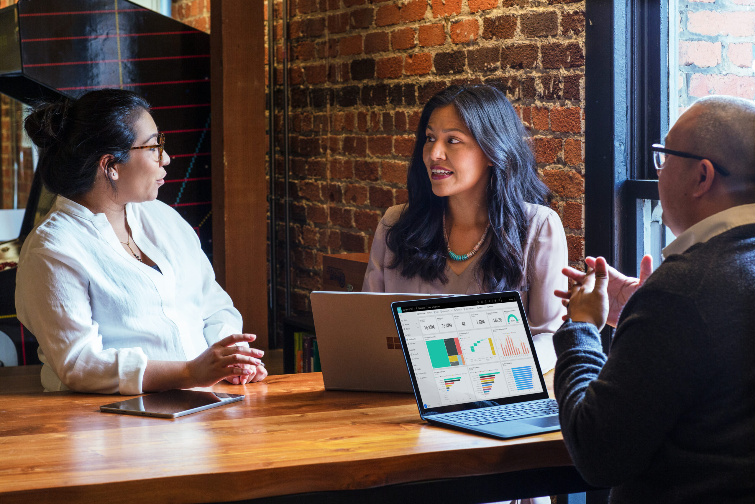 Photo of salespeople in a meeting in a casual setting