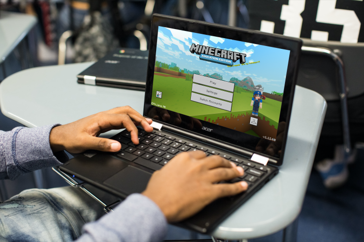 Laptop with the Minecraft Education Edition screen.