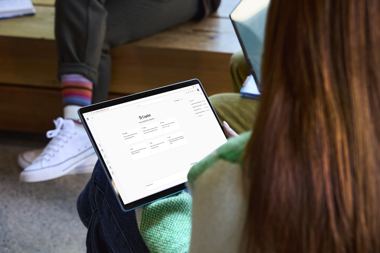 A higher education student using Microsoft Copilot on a tablet device
