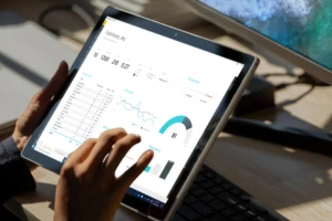 A person sitting on the keyboard of a laptop computer. A data-driven culture can lead to innovation.