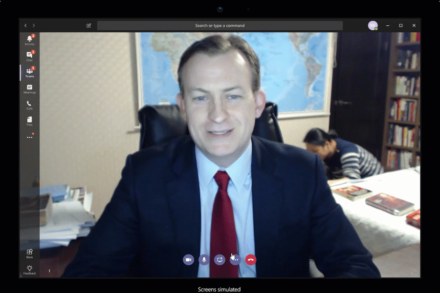 Animated image of a man blurring his background in Teams.