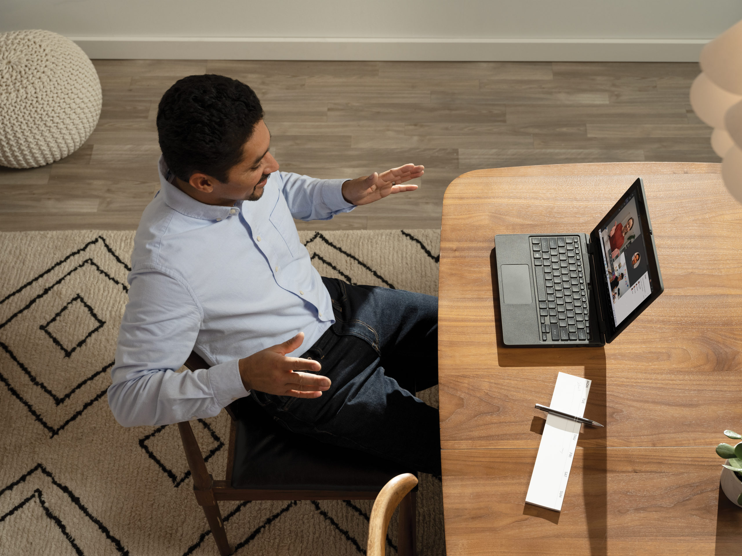 teacher with online class with Acer TravelMate B311 2-in-1. Keywords: remote education, remote learning, home school, study from home