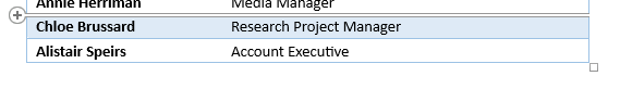 Screenshot of a table with a row insertion button visible