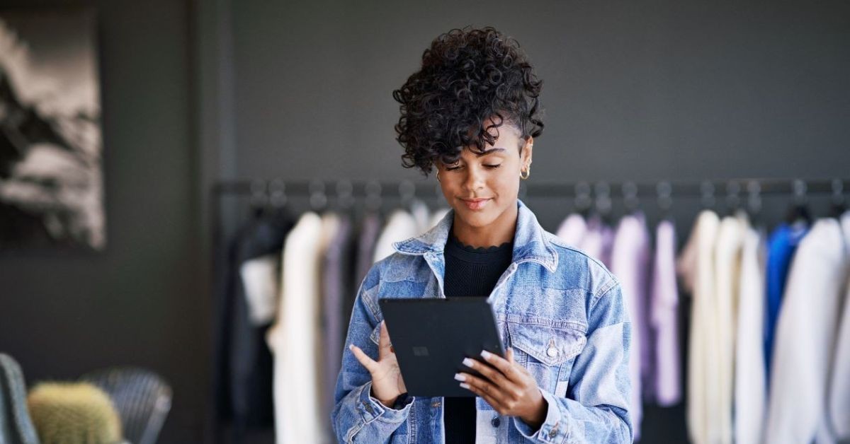A woman holding a tablet