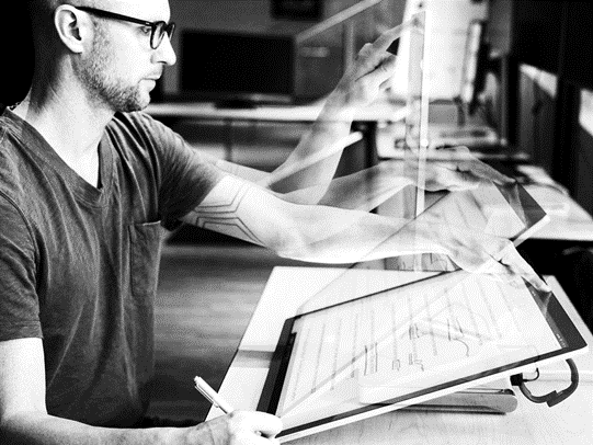 Man working on Surface Studio