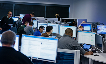 Image of security IT workers in an office setting
