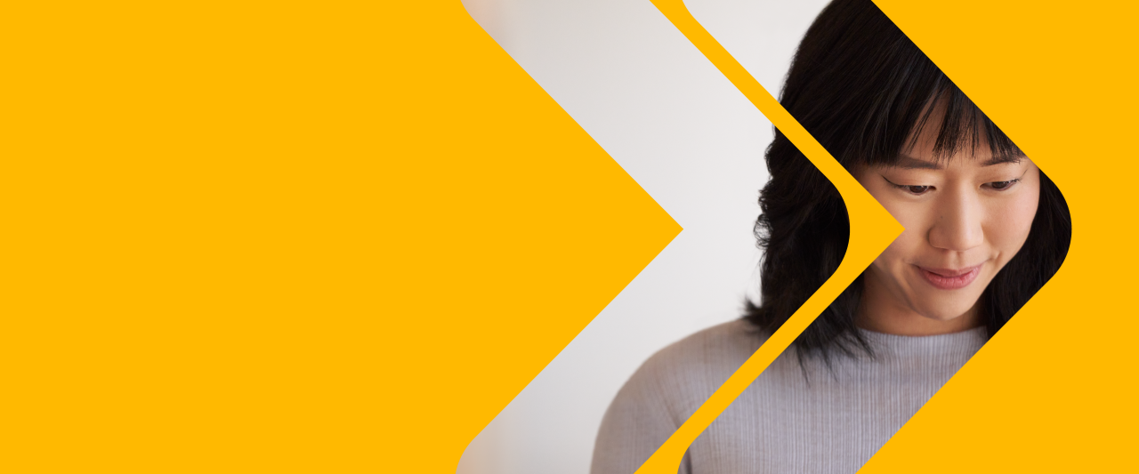 Stop Ransomware with Microsoft Security digital event yellow blog banner with woman working at computer