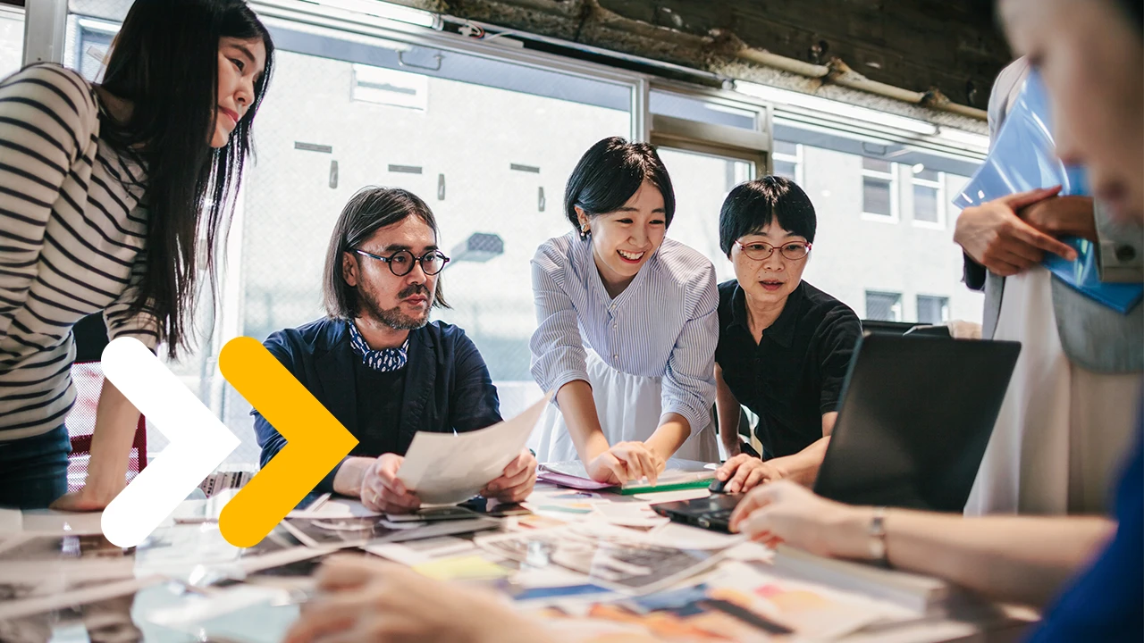 Group of people are working together in a modern working space in Tokyo