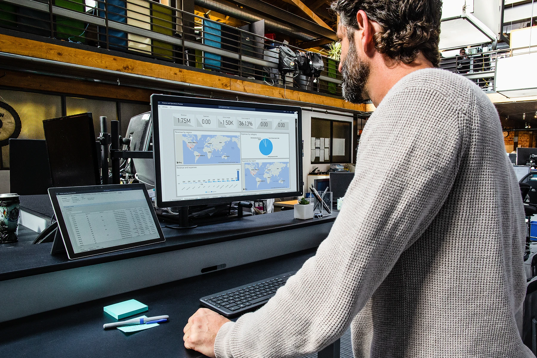 Operations manager working at standing desk