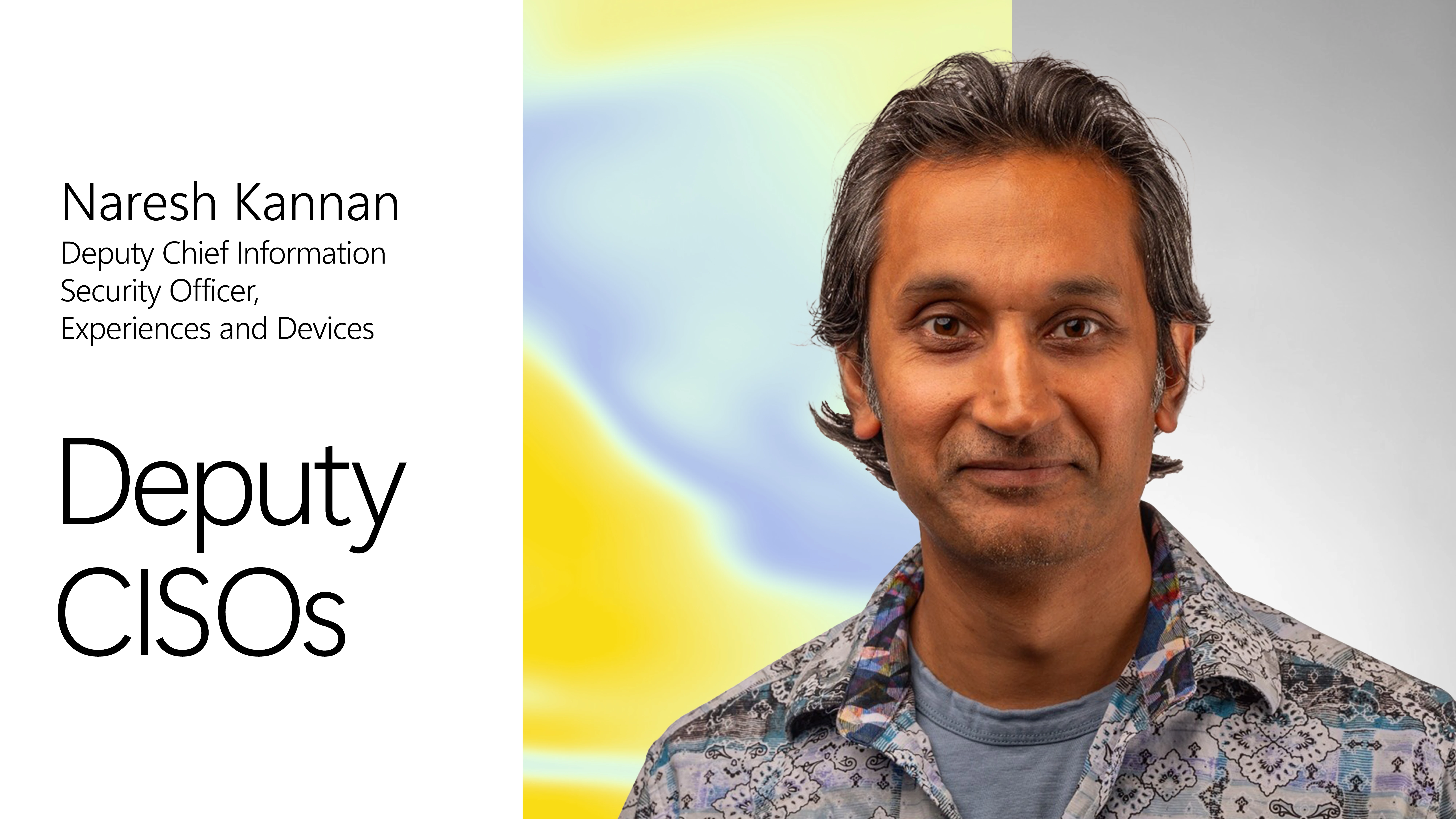 A man in a blue shirt with a blue and yellow background with black text